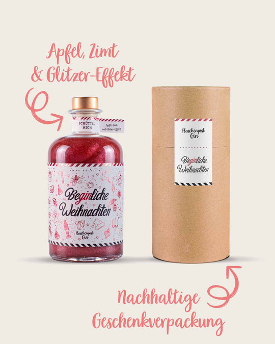 Die Beginliche Weihnachten Limited Edition mit dem Geschmack von Apfel und Zimt und Glitzer-Effekt und die dazugehörige nachhaltige Geschenktverpackung stehen vor einem neutralen Hintergrund. 